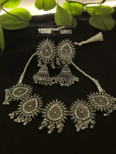 Silver necklace and earrings