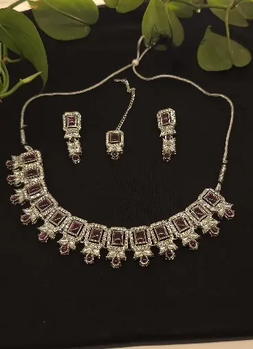 Silver necklace and earrings
