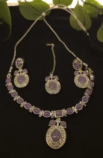 Silver necklace and earrings